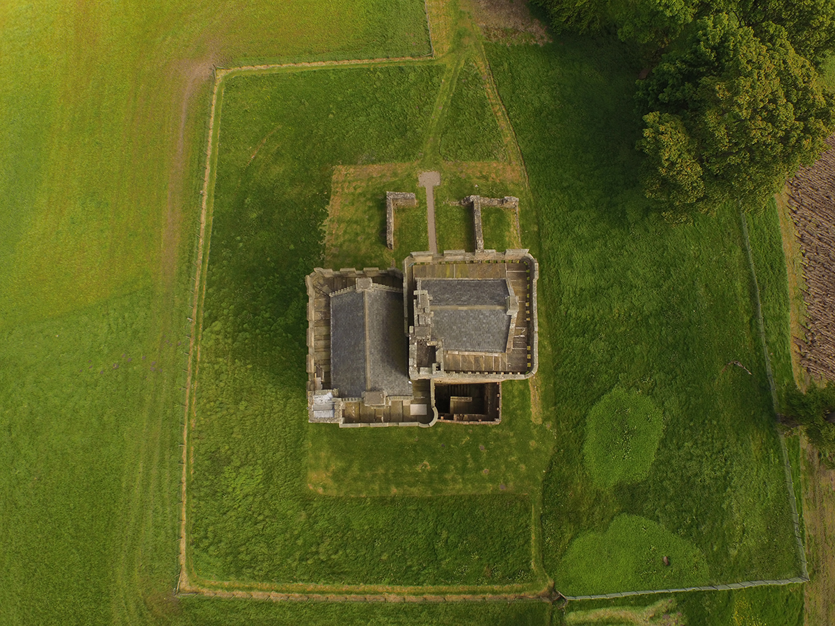 Direct bird's-eye aerial shot of Clackmannan Tower roof and grounds
